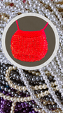 Miniature Beaded Bag Collection showcases Grace's Handmade Knit & Bead Money Bag Necklace Red - Charlotte and Grace