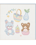 Cross-stitched design of two teddy bears, a basket, and a bottle on a light background.