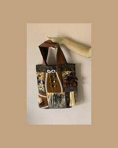 Tote bag with artistic design on a beige background