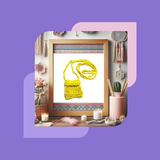A hand holding a small, beaded bag necklace with yellow beads against a background with free spirit décor. 