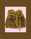 Gold bead knitted pouch bag on a beige background