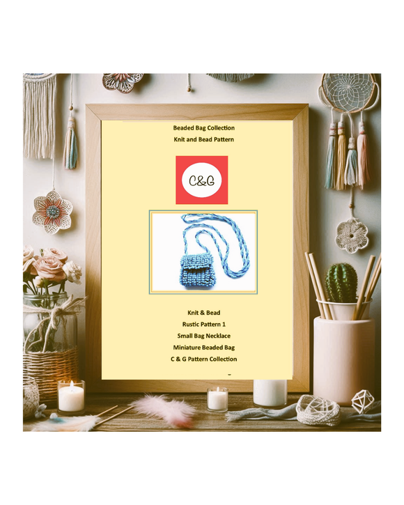 Framed knit and bead pattern book on a decorative table with candles and plants.
