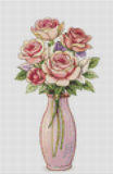 Cross-stitched pattern of a vase with flowers on a grid background