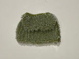 Green beaded bag on a white background