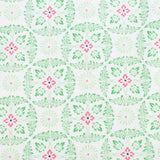 Medallion patterned fabric with green and pink floral design on a white background