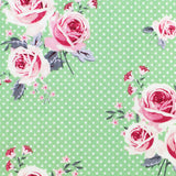 Gutermann floral pattern with pink roses on a green background with white polka dots