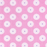 Gutermann fabric with white floral daisy patterns with blue centres on a pink background