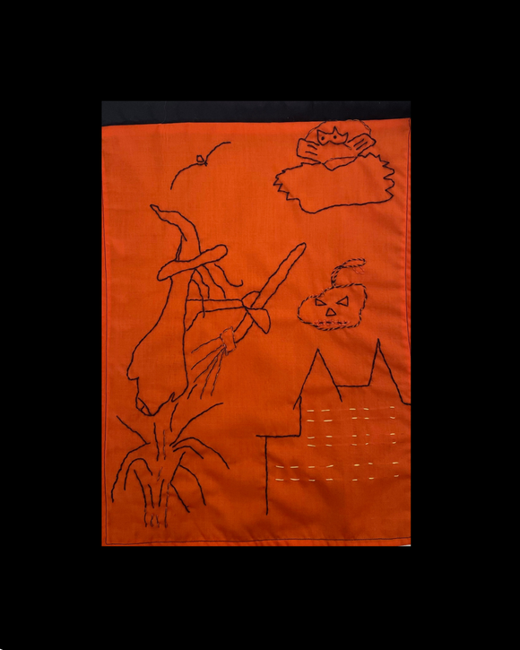 Halloween Stitchery Witch
Hand Embroidered stitch design on orange fabric featuring a witch, pumpkin, and castle.