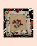small personal purse-bag with bead embroidery on a colourful and pink boarder