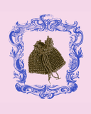 Decorative blue frame with a brown beaded pouch bag on a pink background