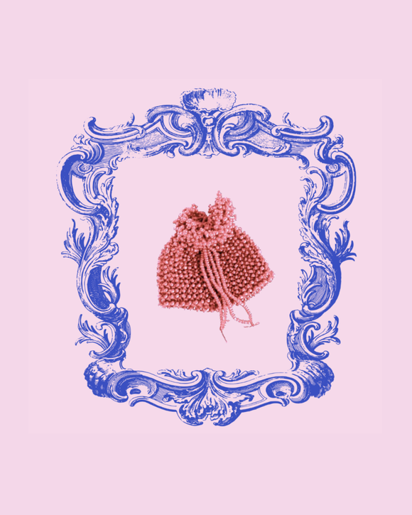 Pink knitted and beaded pouch with a decorative blue frame on a pink background