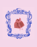 Pink knitted and beaded pouch with a decorative blue frame on a pink background