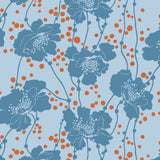 Pattern of blue flowers and orange dots on a light blue fabric background