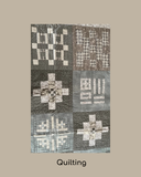Quilt with geometric pattern on a beige background
