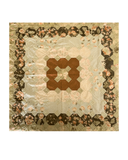 Quilt with hexagon pattern on a beige background