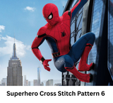 Superhero character in a red and blue costume climbing a building with a cityscape in the background. Writing says superhero cross stitch pattern 6