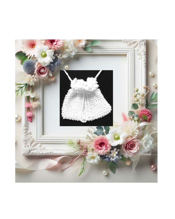 White beaded pouch in a decorative wedding frame surrounded by flowers on a white background