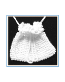 White beaded pouch on a black and white background