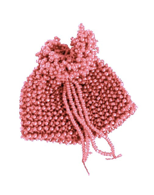 A handmade pink beaded pouch with bead drawstring closure on white background