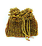 A handmade brown beaded pouch with a beaded drawstring closure.