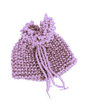 A handmade mauve beaded pouch with a beaded drawstring closure.
